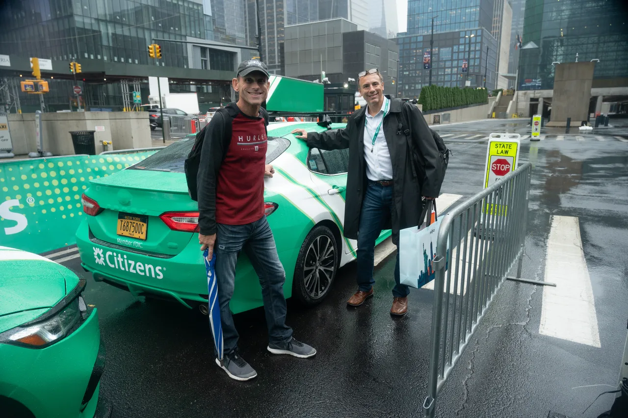 Citizens campaign on a 360 wrap + digital top vehicle in New York, 2025