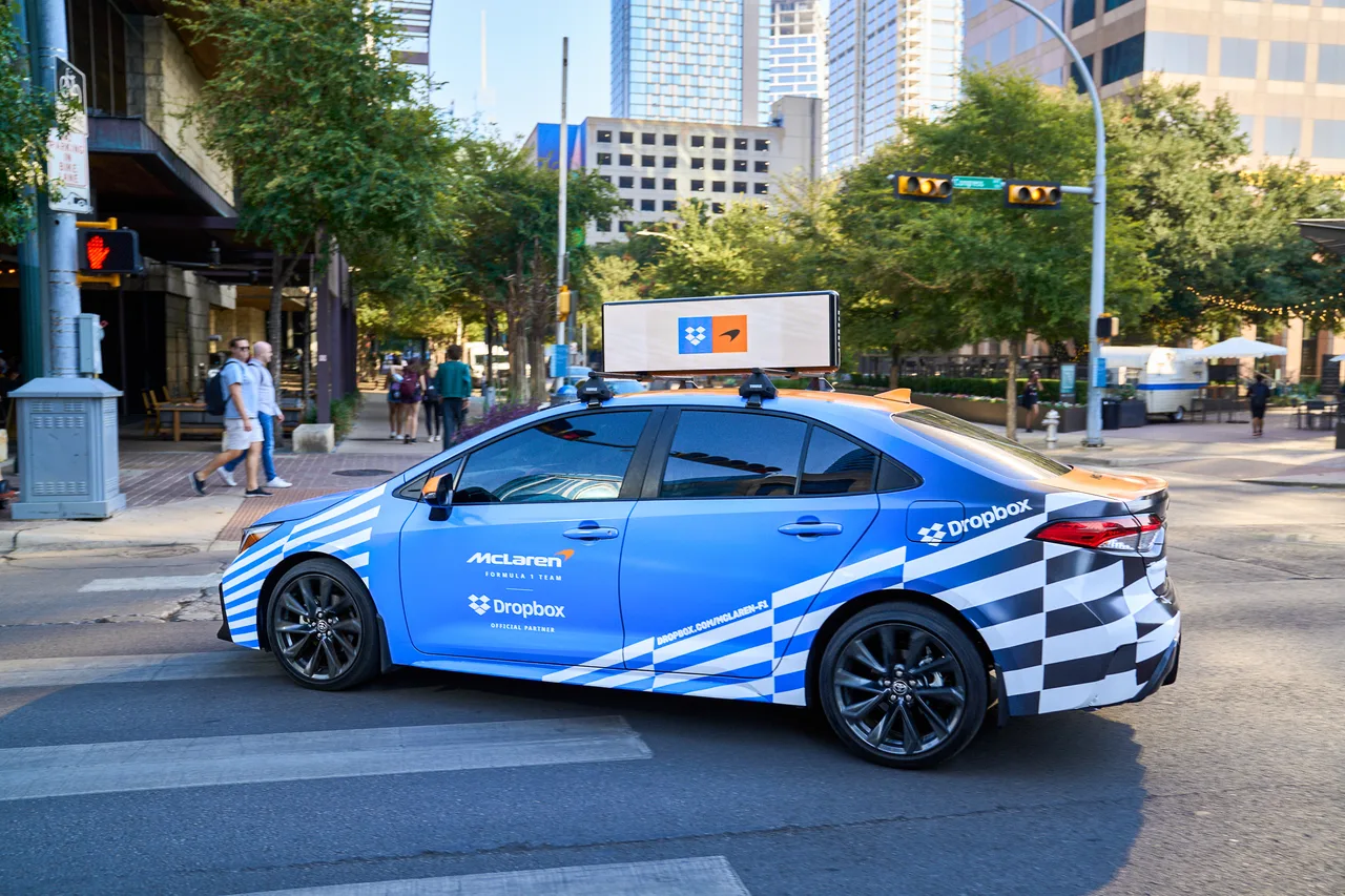 Dropbox campaign on a 360 wrap + digital top vehicle in Austin, 2024
